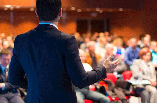 Man speaking at conference